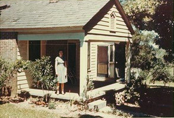 Janet Hamrick Pooley at one of the rental houses.